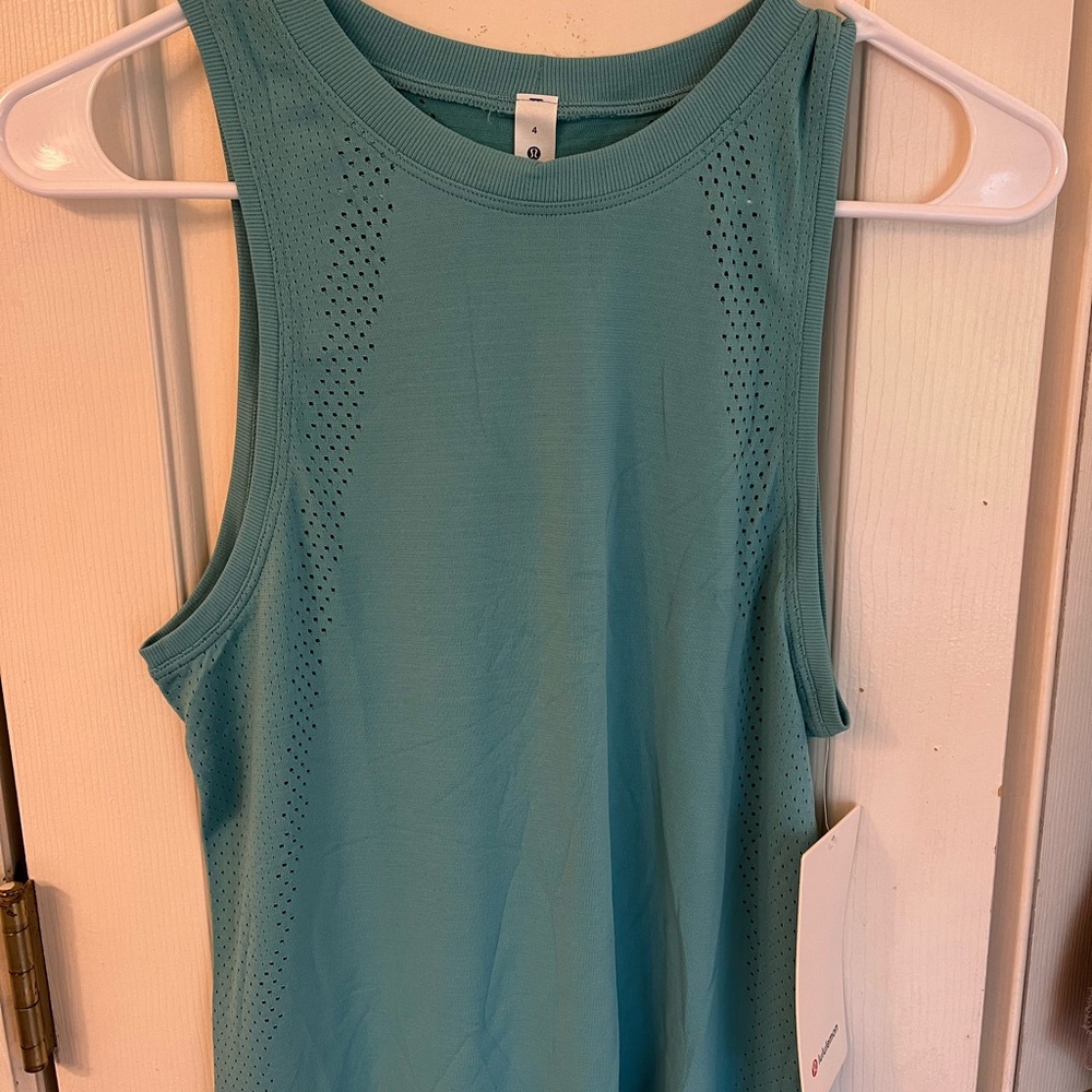 Lululemon Train to Be Tank. Size 4. Brand new, with tags, never worn.